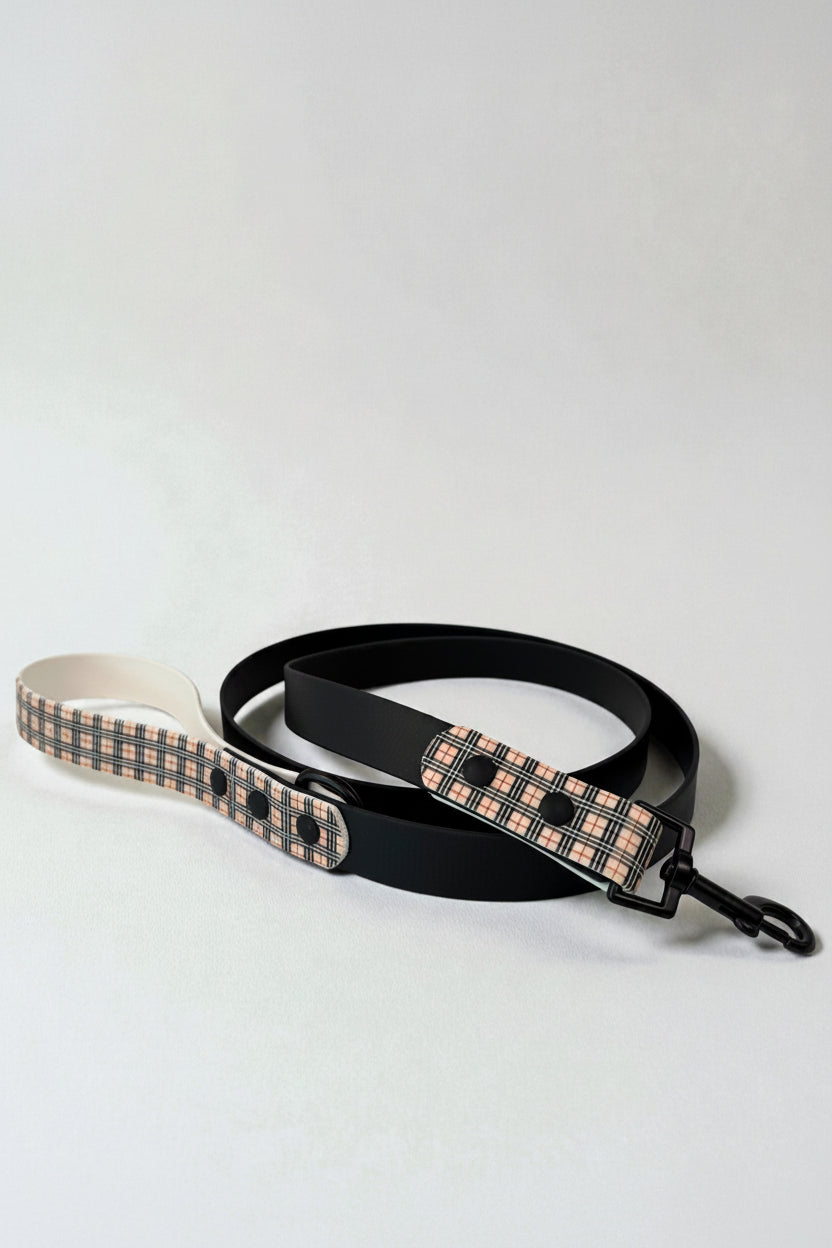 The British Plaid Biothane dog leash on a white background
