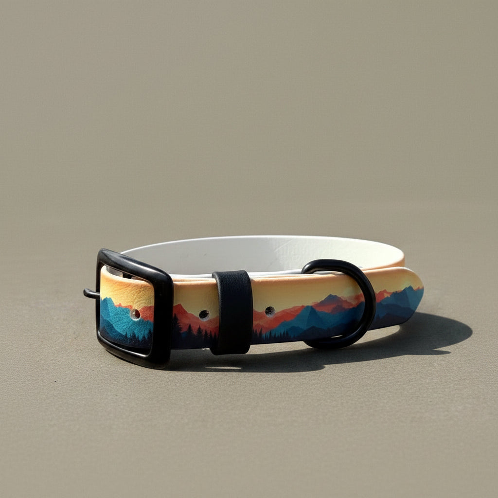 Dog collar with a scenic mountain design on a beige background