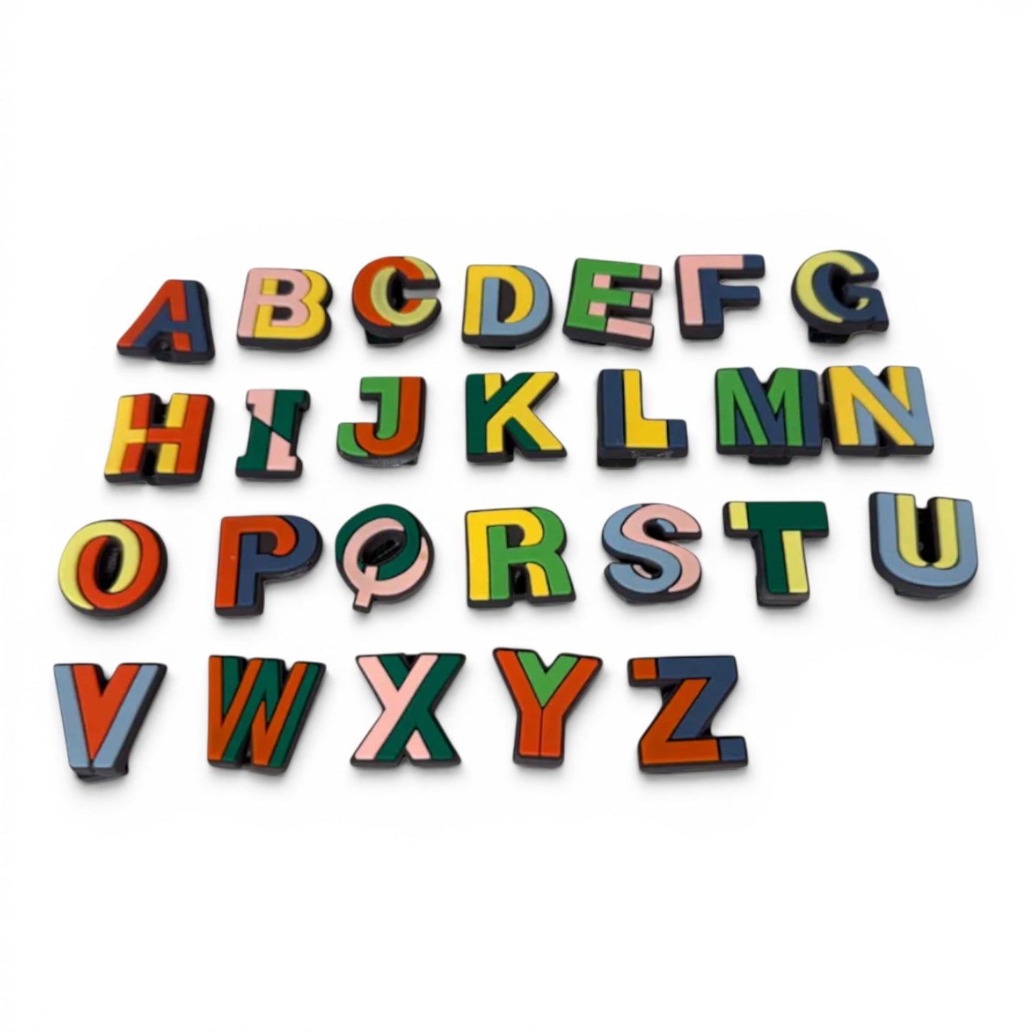 Colorful alphabet dog collar charm letters on a white background