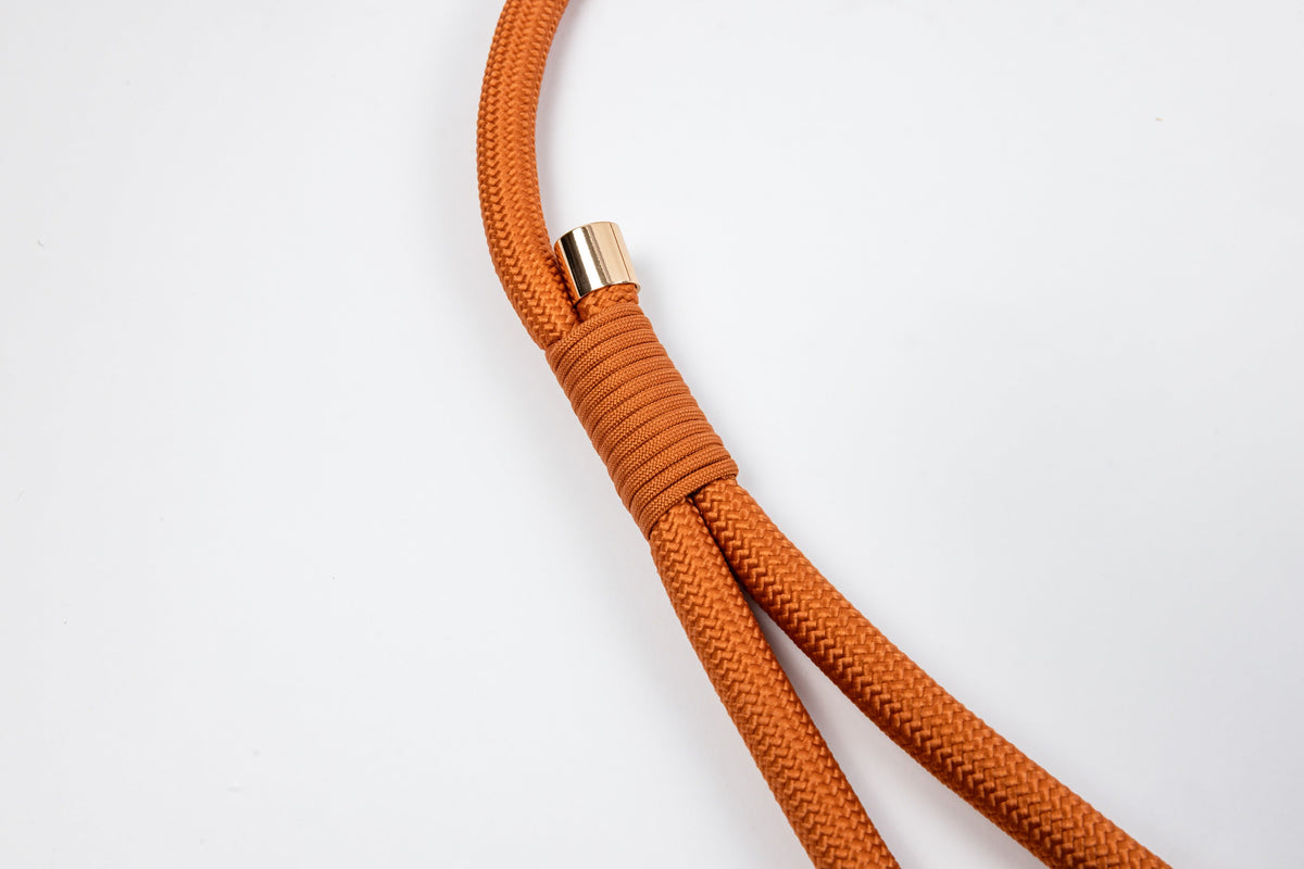 Caramel Signature Rope leash wrapped handle and brass accent detail