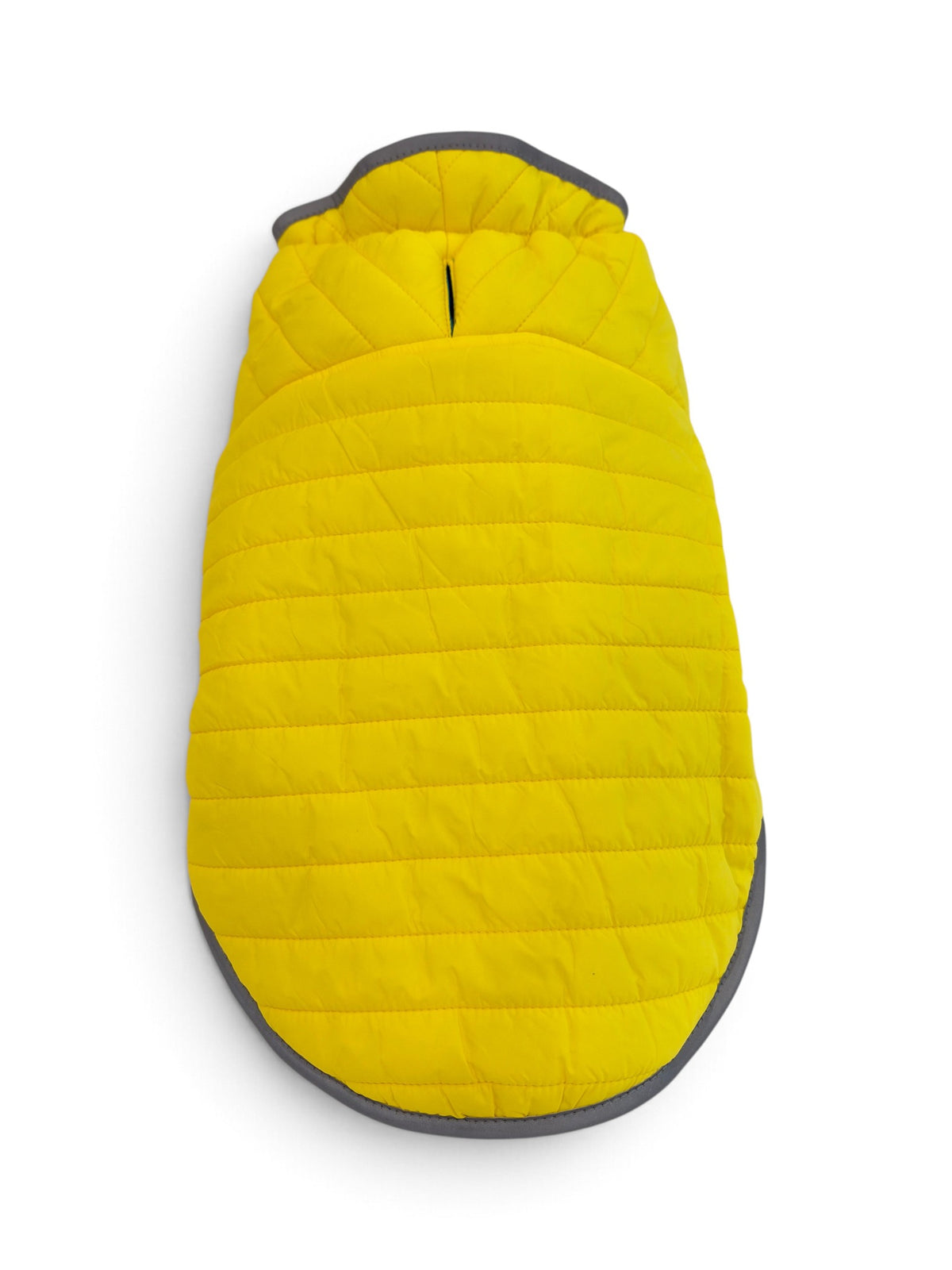 Adventurer reversible dog puffer vest with yellow side facing out, back view
